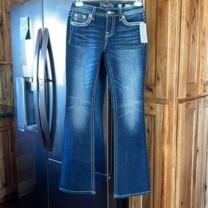 Miss me jeans, size 27, inseam 34. Brand new! Color is blue denim ,boot cut.